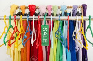 29225759-Empty-rack-of-clothes-and-hangers-after-a-big-sale-Sale-sign--Stock-Photo